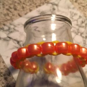 Yellow band with orange bead